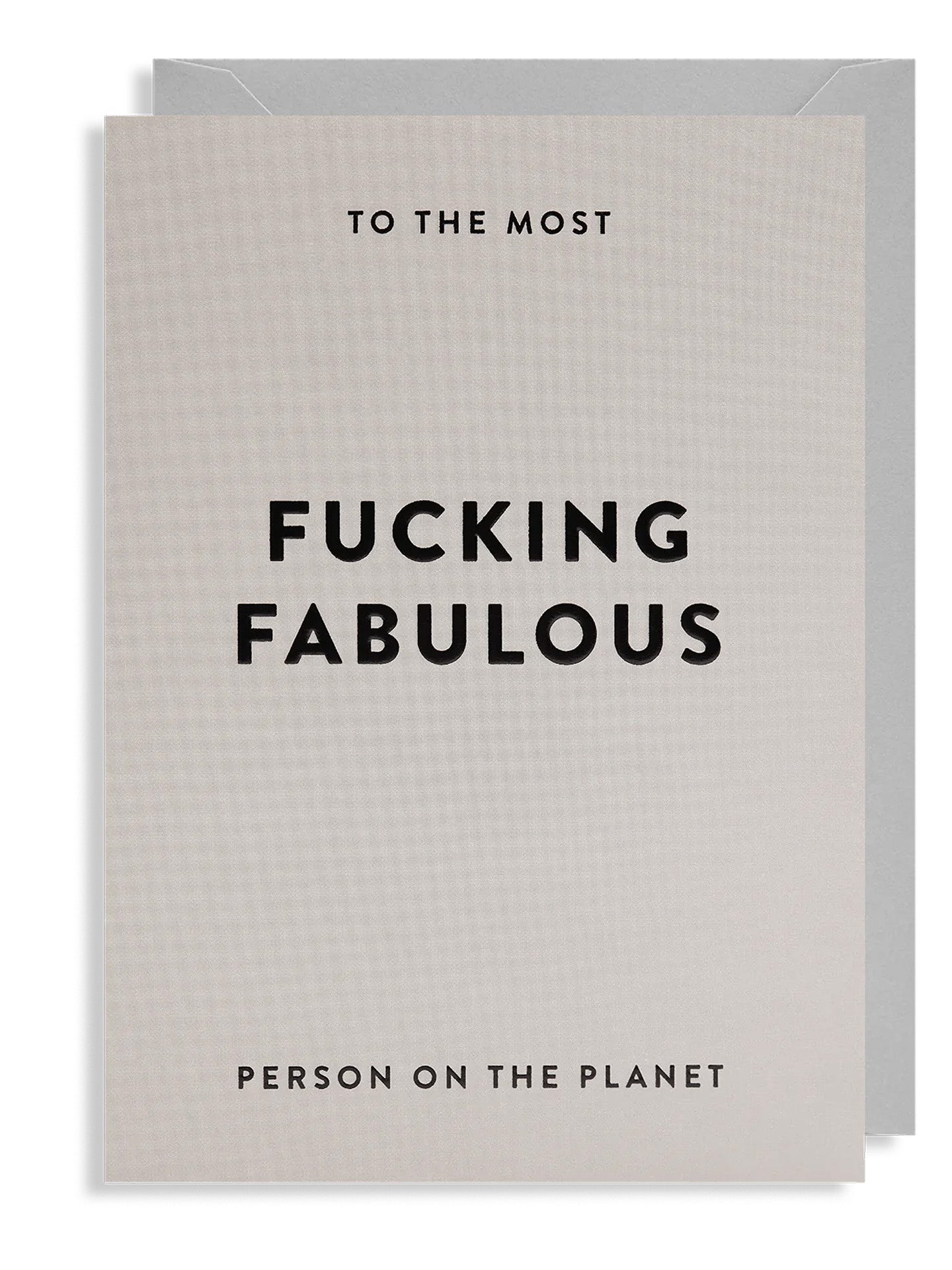 Greeting card with text 'To the most fucking fabulous person on the planet' on a textured beige background.