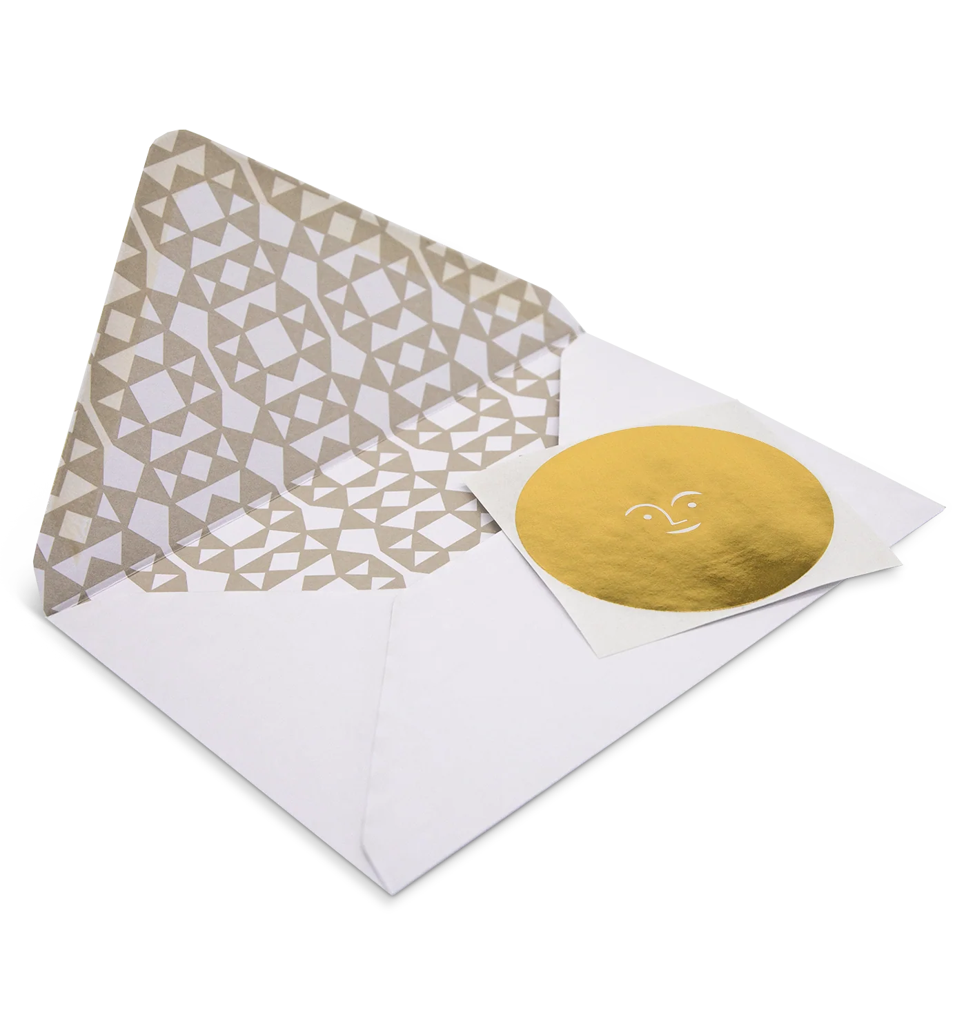 Envelope with geometric pattern and gold circular card on a white background