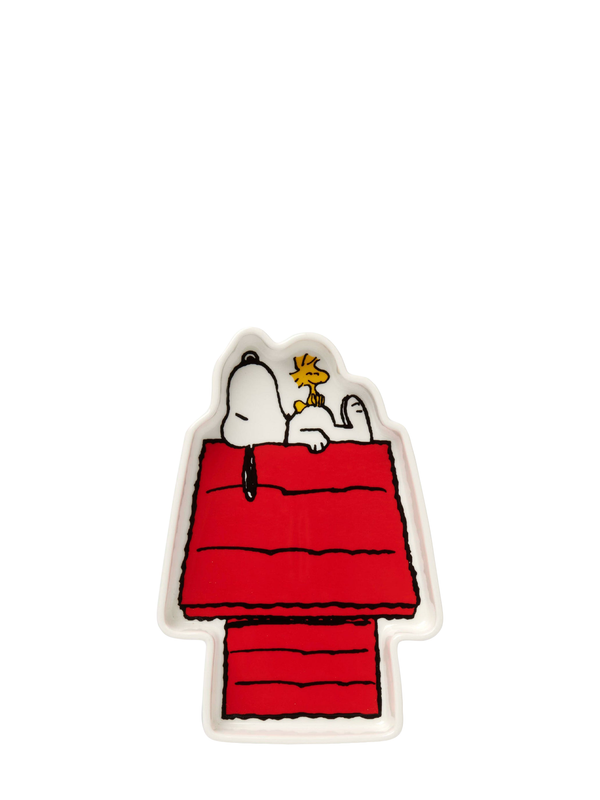 A decorative trinket dish featuring the iconic Peanuts character Snoopy and his friend Woodstock, resting on a red dog house-shaped base.