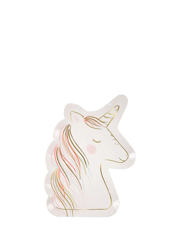 A white paper party plate shaped like a unicorn head, featuring gold line art and pink and gold iridescent accents on a plain white background.