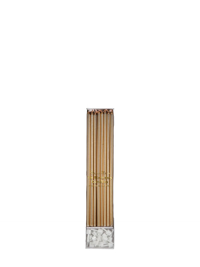 Gold long thin candles