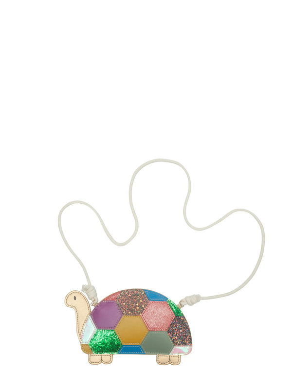 Colorful turtle-shaped handbag with a chain on a white background