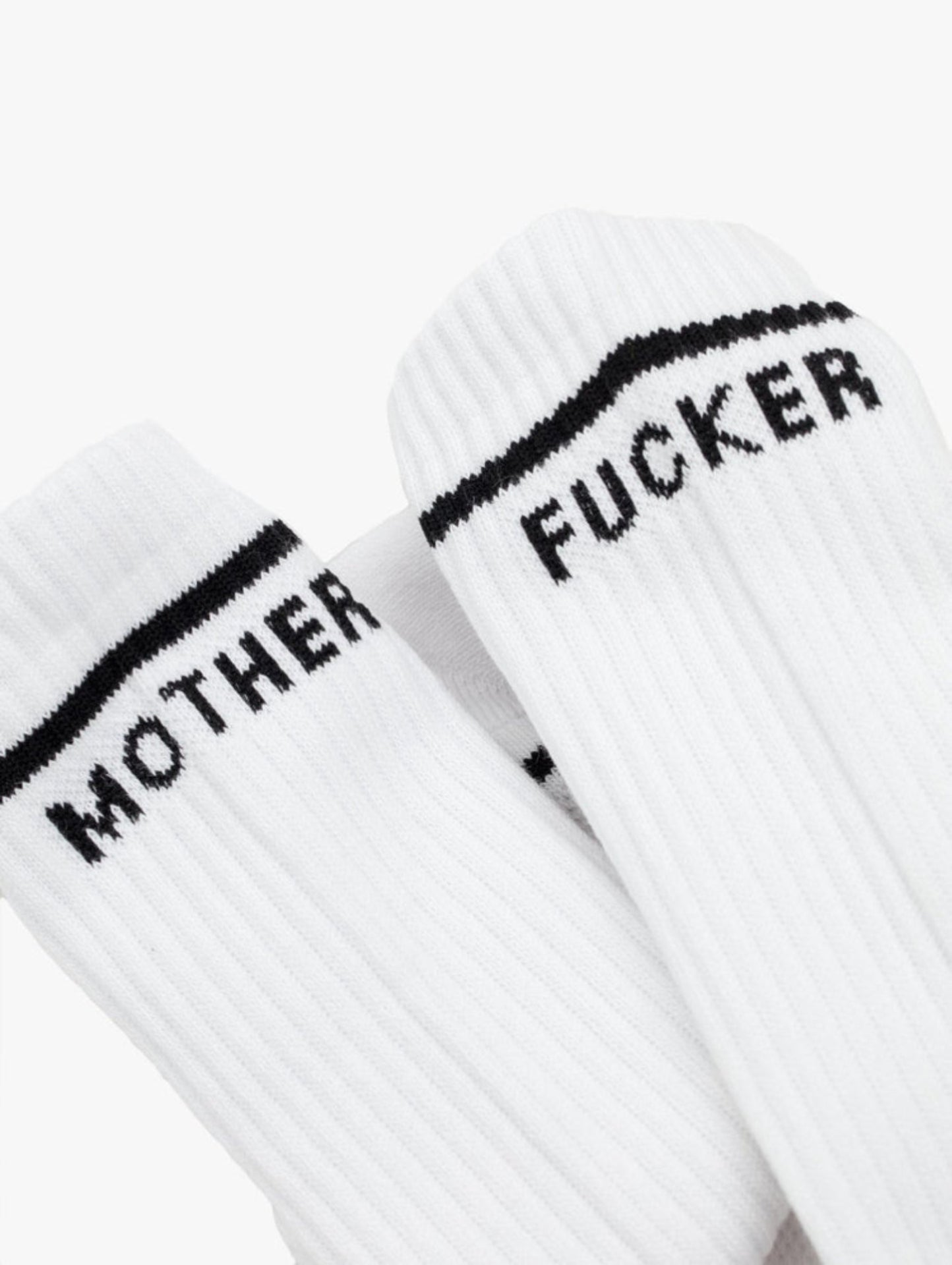White socks with black text on a white background