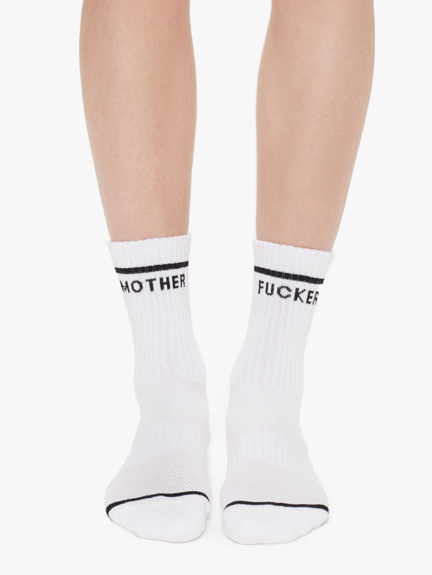 White socks with black text worn by a person on a white background