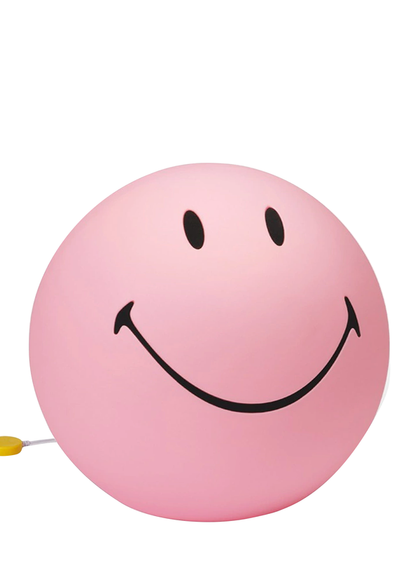 Pink balloon with a smiley face design on a white background