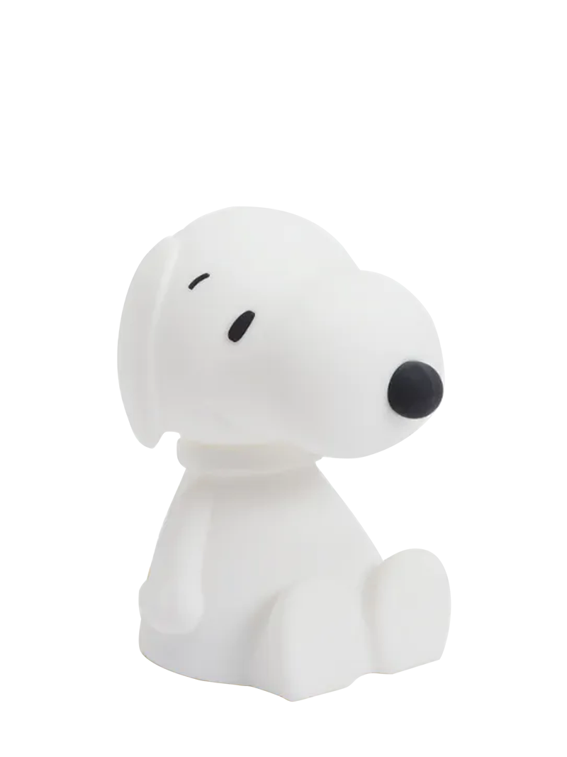 A white, silicone lamp in the shape of the cartoon character Snoopy from the Peanuts comic strip.