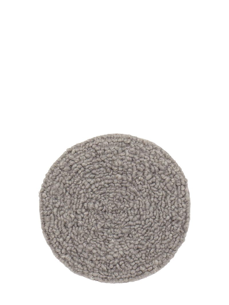 A round, low-pile boucle or sherpa rug in a light gray color, photographed from directly above on a solid white background.