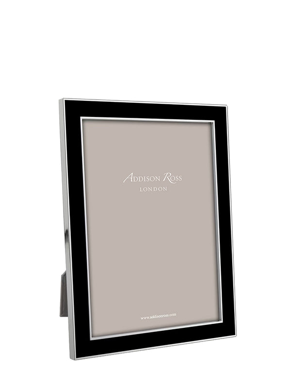 A modern picture frame with a black front border and a polished silver-toned metal frame, standing on a small silver base. The frame is shown empty with a neutral beige insert card featuring the Addison Ross London logo.