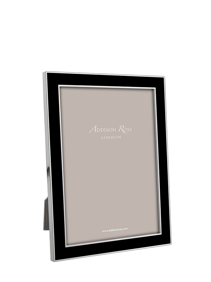 A modern picture frame with a black front border and a polished silver-toned metal frame, standing on a small silver base. The frame is shown empty with a neutral beige insert card featuring the Addison Ross London logo.