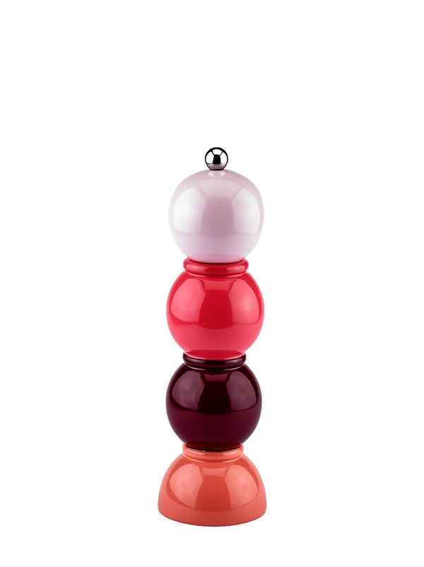 A modern stacked glass sculpture or decorative object featuring four rounded glass spheres in white, red, deep burgundy, and coral, topped with a small metallic silver ball on a plain white background.