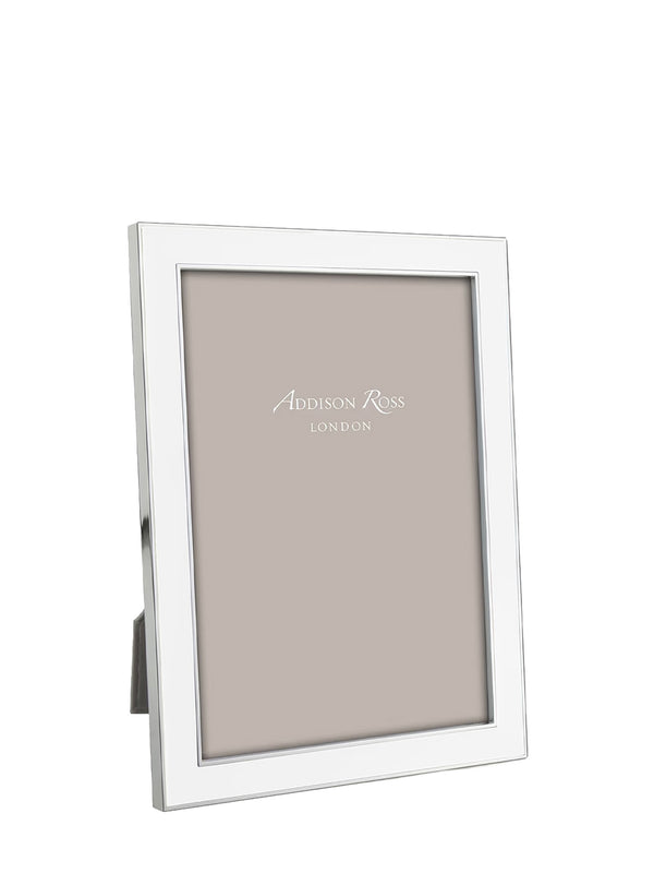 A silver picture frame with a white border and a small stand, shown on a plain white background. The frame has 'Addison Ross London' printed on the insert.