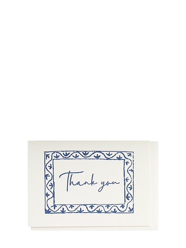 White card with blue decorative border and 'Thank you' text on a white background