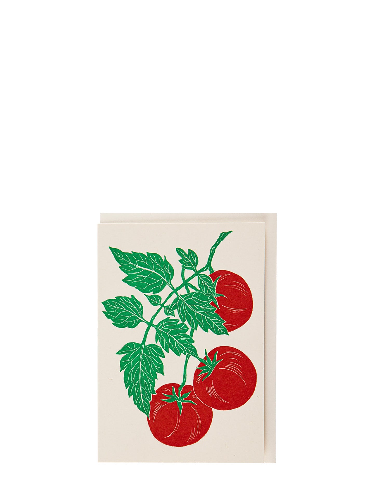 Decorative kitchen towel with red tomatoes and green leaves on a white background