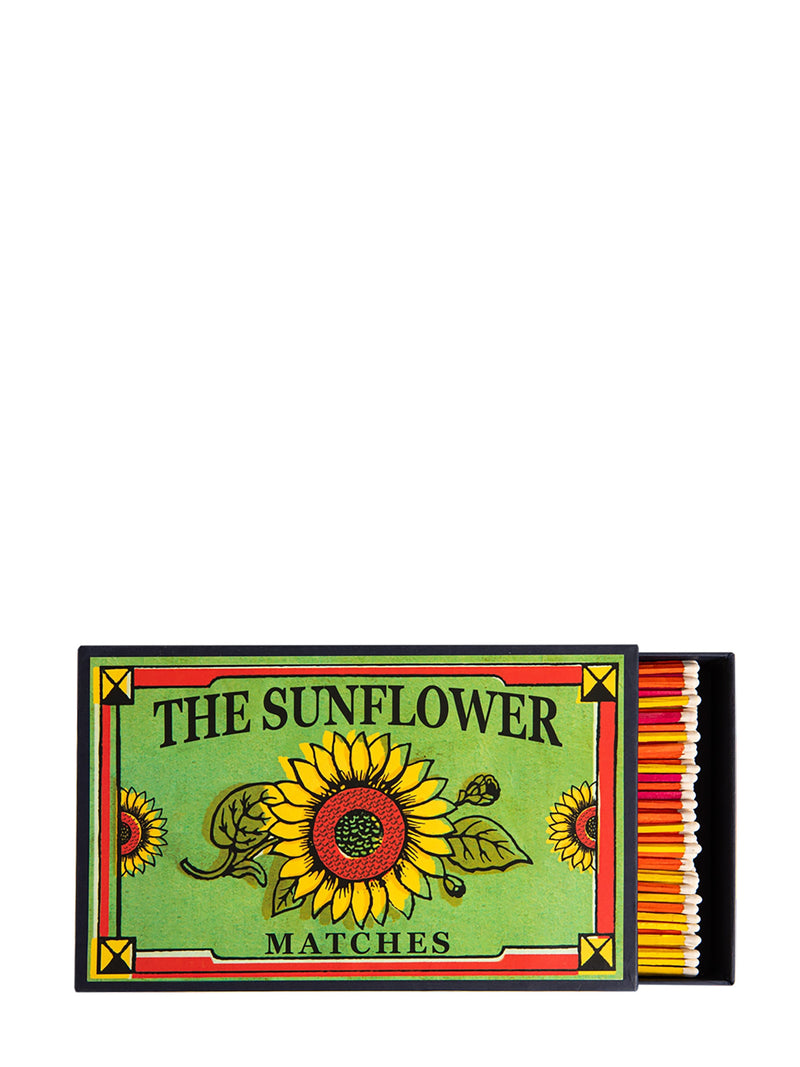 Matchbox labeled 'The Sunflower Matches' with a sunflower design on a white background