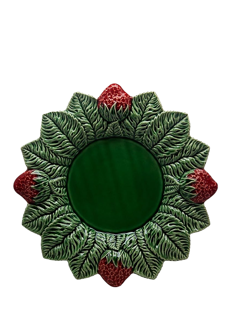 Decorative mirror with green leafy design and red berries on a white background