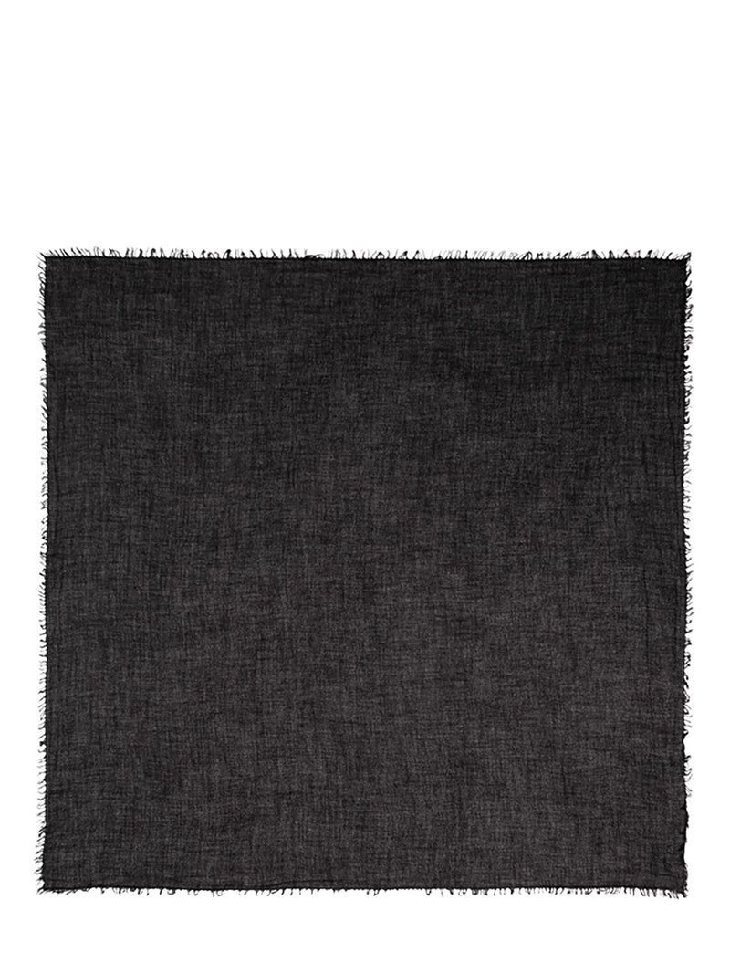 A square black woven scarf with fringed edges, displayed flat against a solid white background.