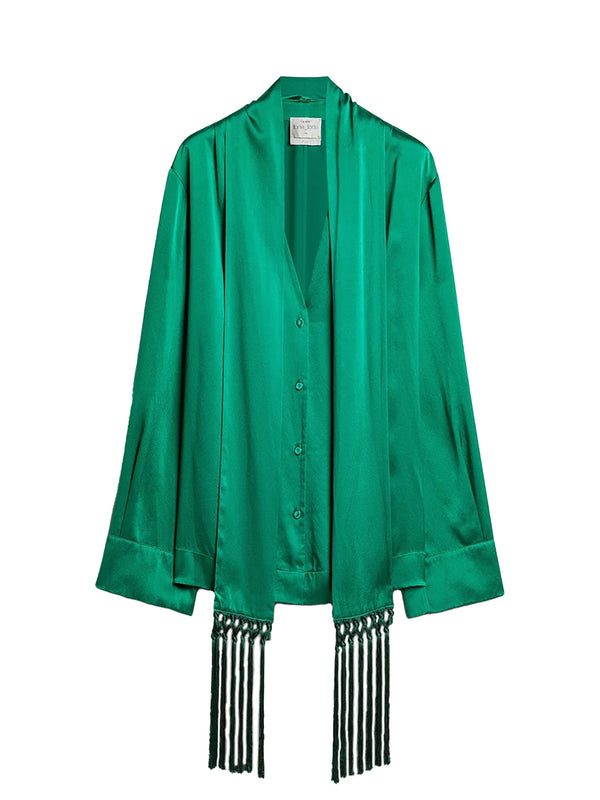 A vibrant emerald green satin shawl cardigan with a button-front closure and long fringe tassels at the hem, displayed against a solid white background.