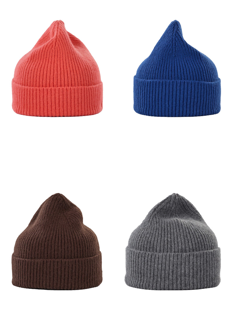 Four ribbed knit beanie hats arranged in a 2x2 grid on a white background, shown in coral red, royal blue, dark brown, and heather gray.