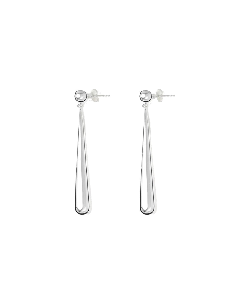A pair of silver drop earrings with a small round bezel-set clear stone at the top and a long, tapered openwork metal dangle below, shown on a plain white background.