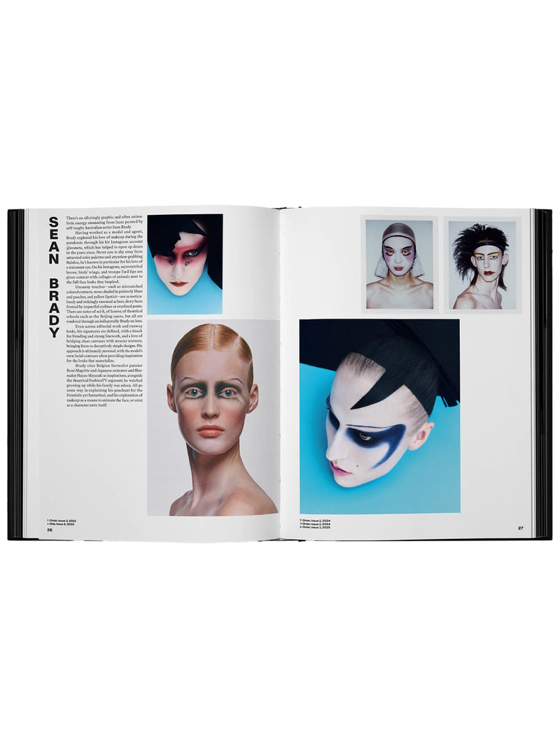 Open book showing pages about Sean Brady with fashion and makeu-up model photos and text on a white background