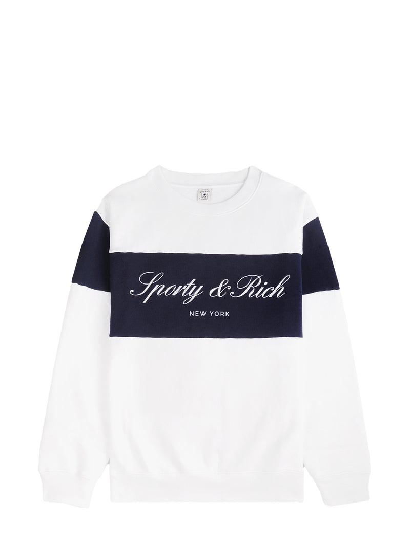 A white crewneck sweatshirt with a navy blue horizontal chest stripe and matching navy sleeves. The chest features a white script logo reading 'Sporty & Rich' with 'NEW YORK' printed below it.