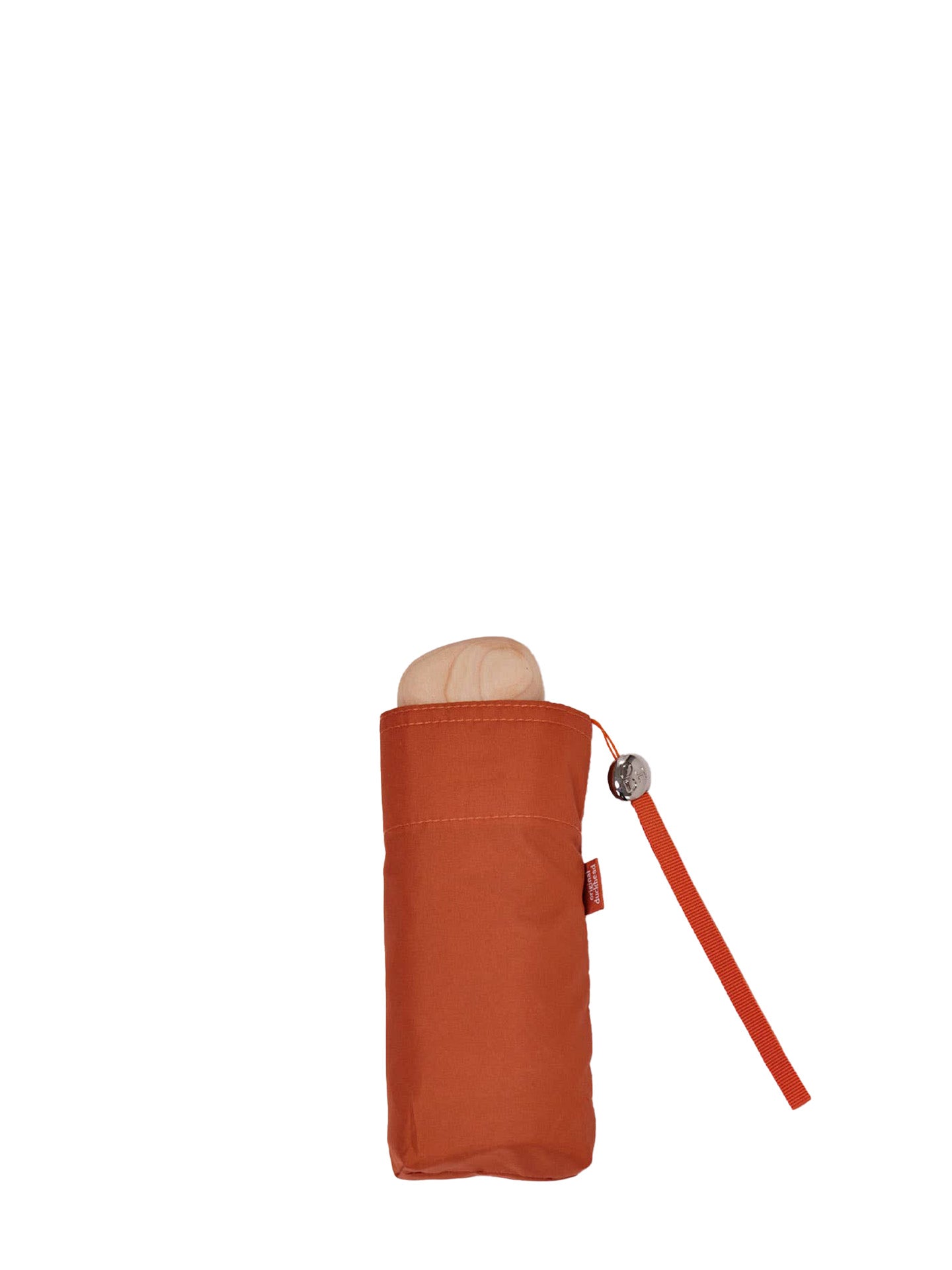 A folded orange compact umbrella in a matching fabric sleeve with a round birch wood handle, a wrist strap and silver metal clasp, shown on a plain white background.