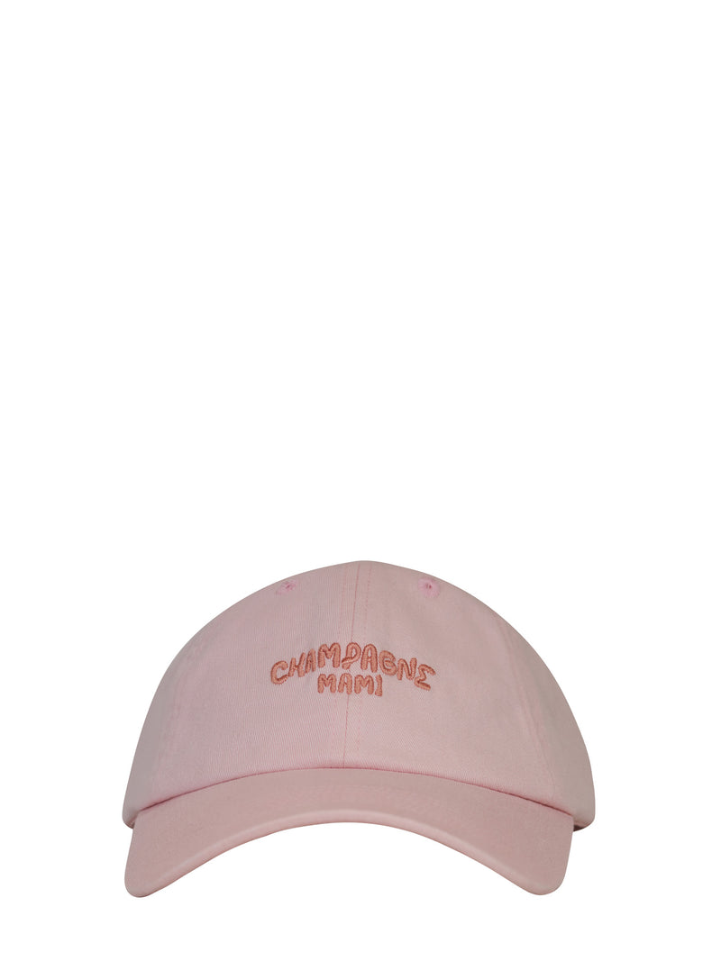 Pink cap with 'Champagne Mami' embroidery on a white background