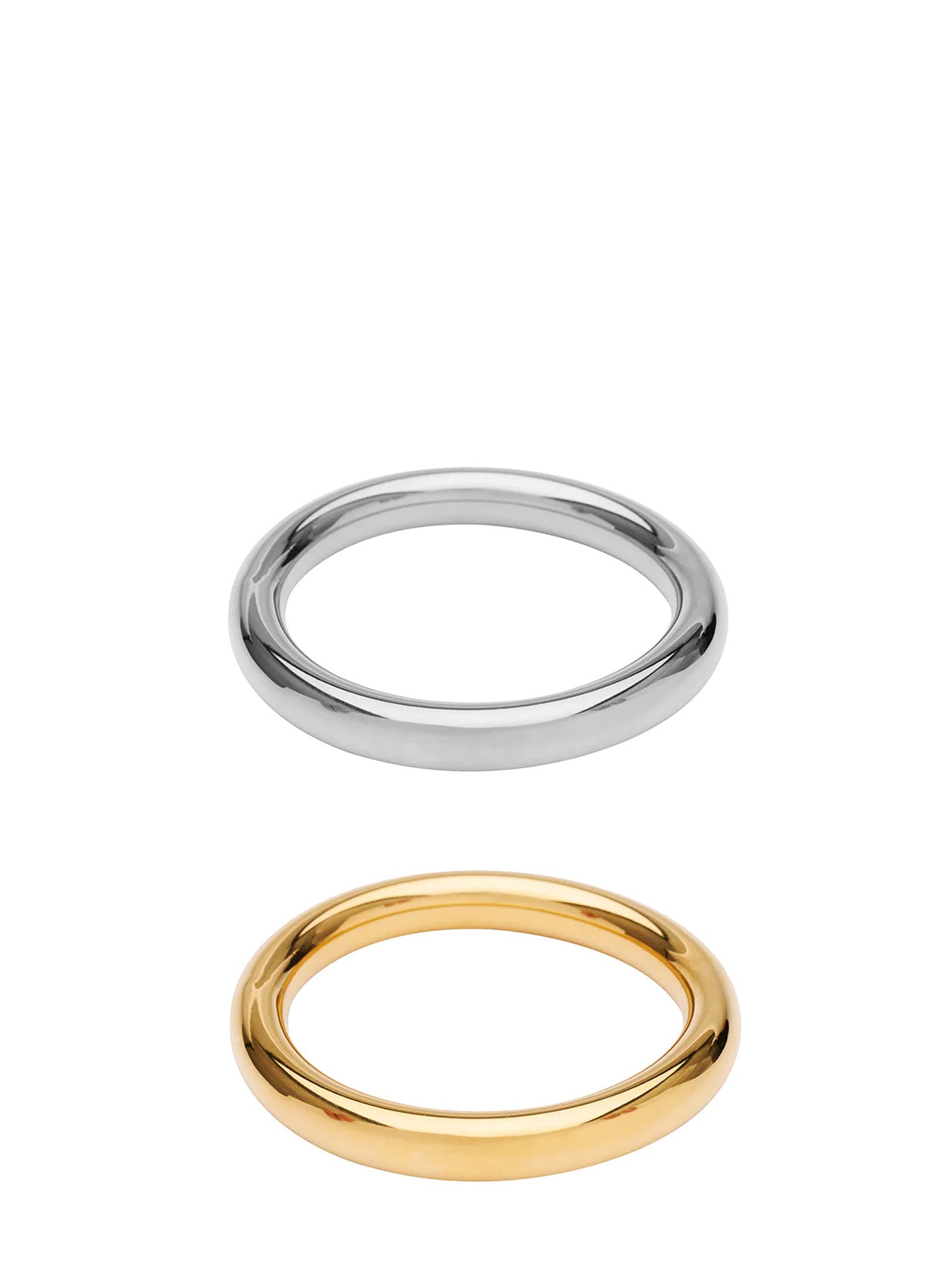 Two minimalist flat-band bracelets, one polished silver-tone and one polished yellow gold, stacked vertically on a solid white background.