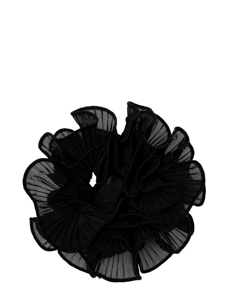A black sheer ruffled hair scrunchie made of layered mesh fabric, shown against a plain white background.