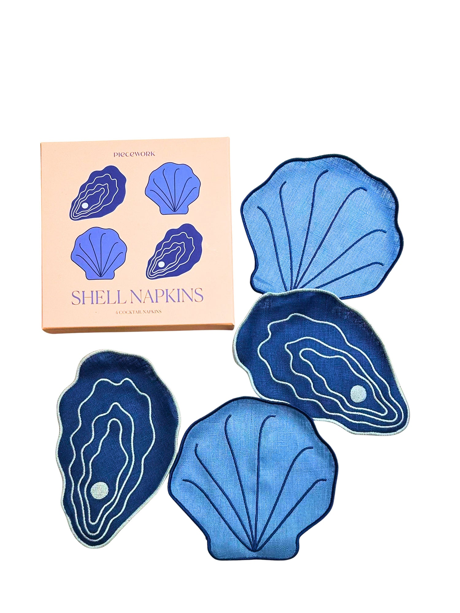 Blue shell-shaped napkins with packaging on a white background
