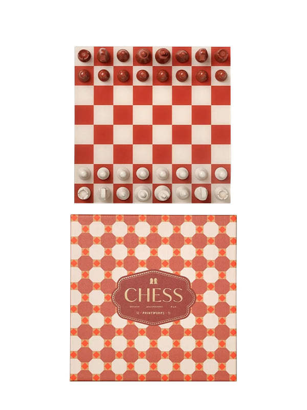 A red and cream checkered chess set with white and cream pieces, shown above its matching Maroccon tile patterned box featuring the brand name Printworks above the game's name, CHESS.