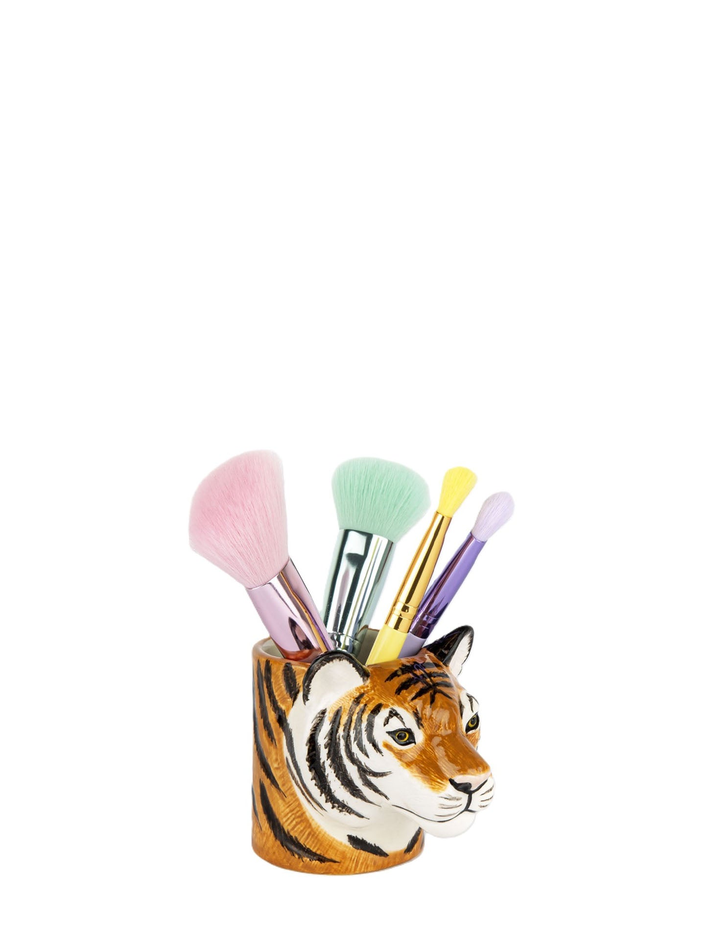 A tiger-head makeup brush holder filled with assorted makeup brushes, shown on a plain white background.