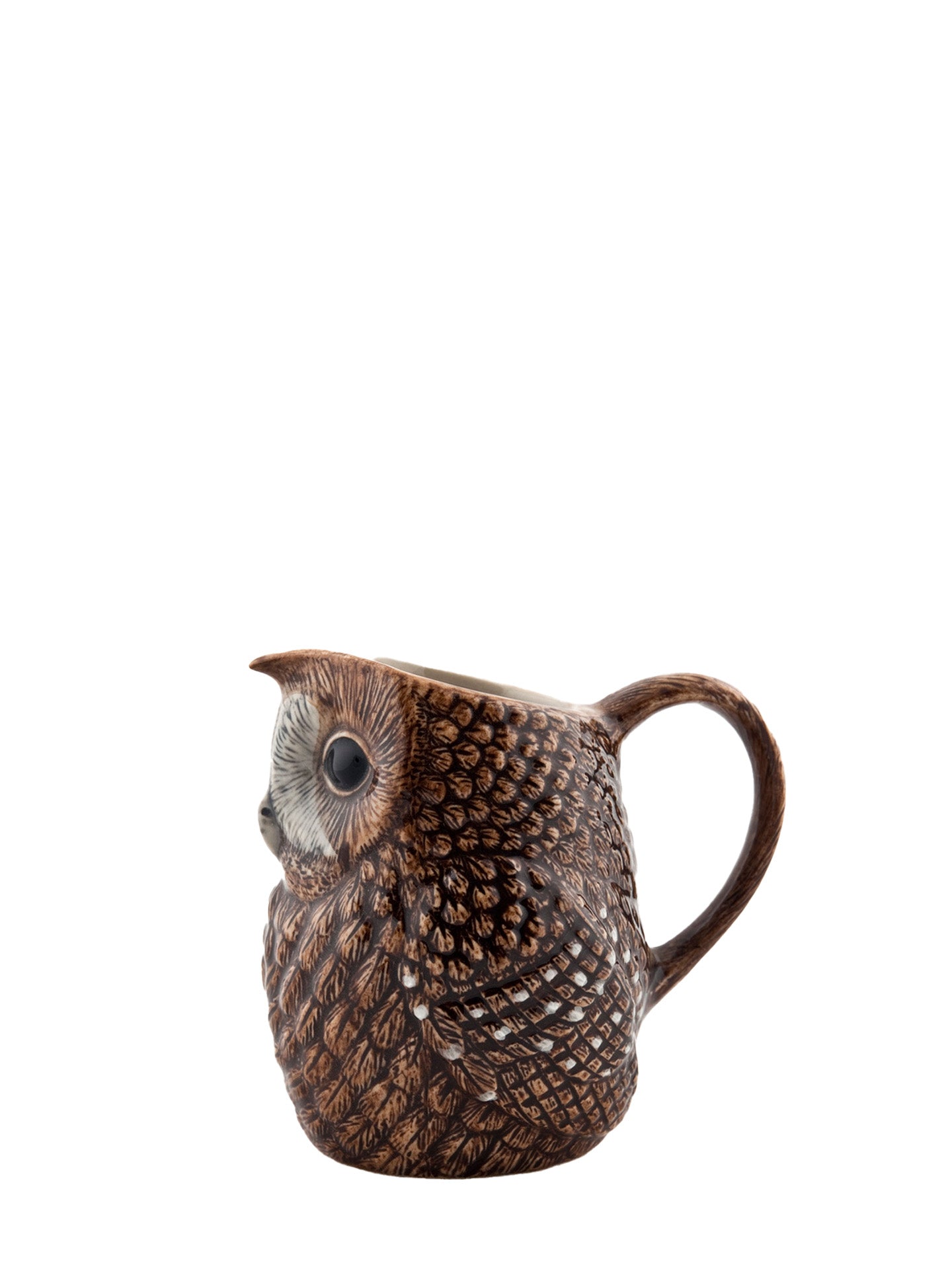 An owl-shaped ceramic jug with a textured brown and black feather pattern, a white face, and a dark eye, shown on a plain white background.