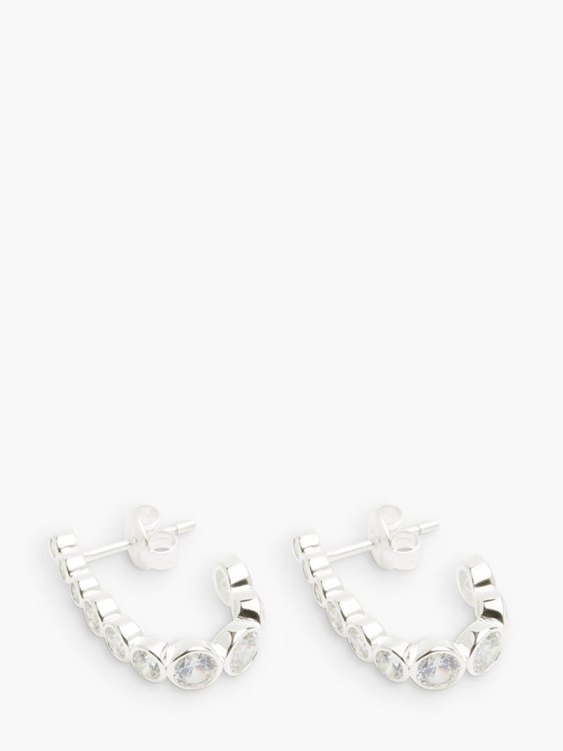 Silver hoop earrings on a white background