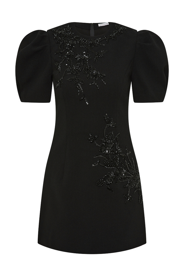 Black dress with sequin embellishments on a white background