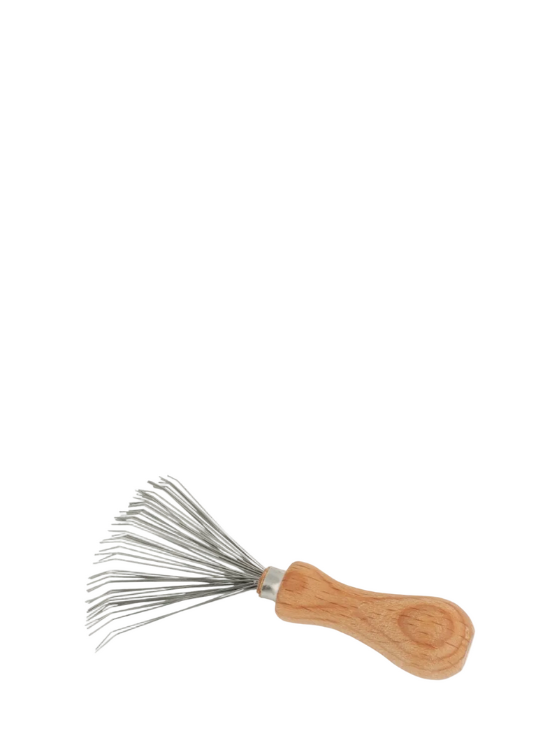 A small beechwood comb and brush cleaner with metal wire bristles and a rounded handle.