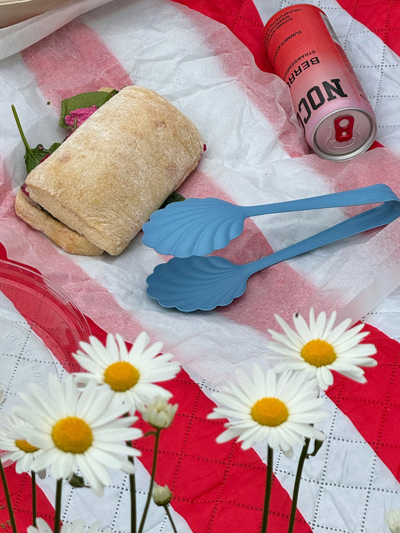 Pastel blue shell-shaped salad tongs