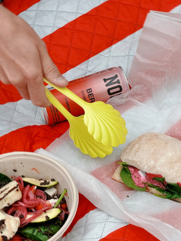 Shell-shaped salad tong, neon yellow