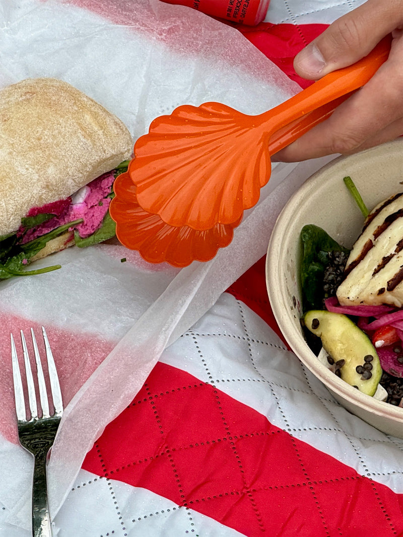 Shell-shaped salad tong, orange