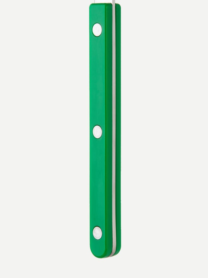 Green metal rod with holes on a white background