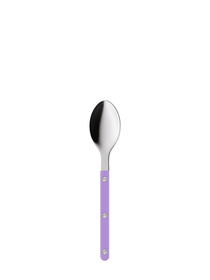 Spoon with a purple handle on a white background