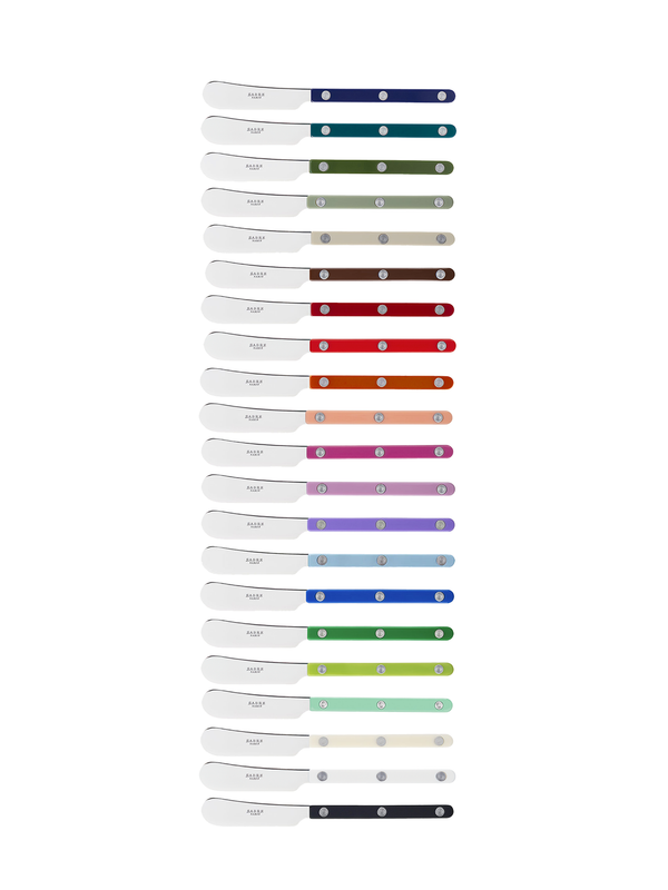 Set of colorful butter spreader on a white background
