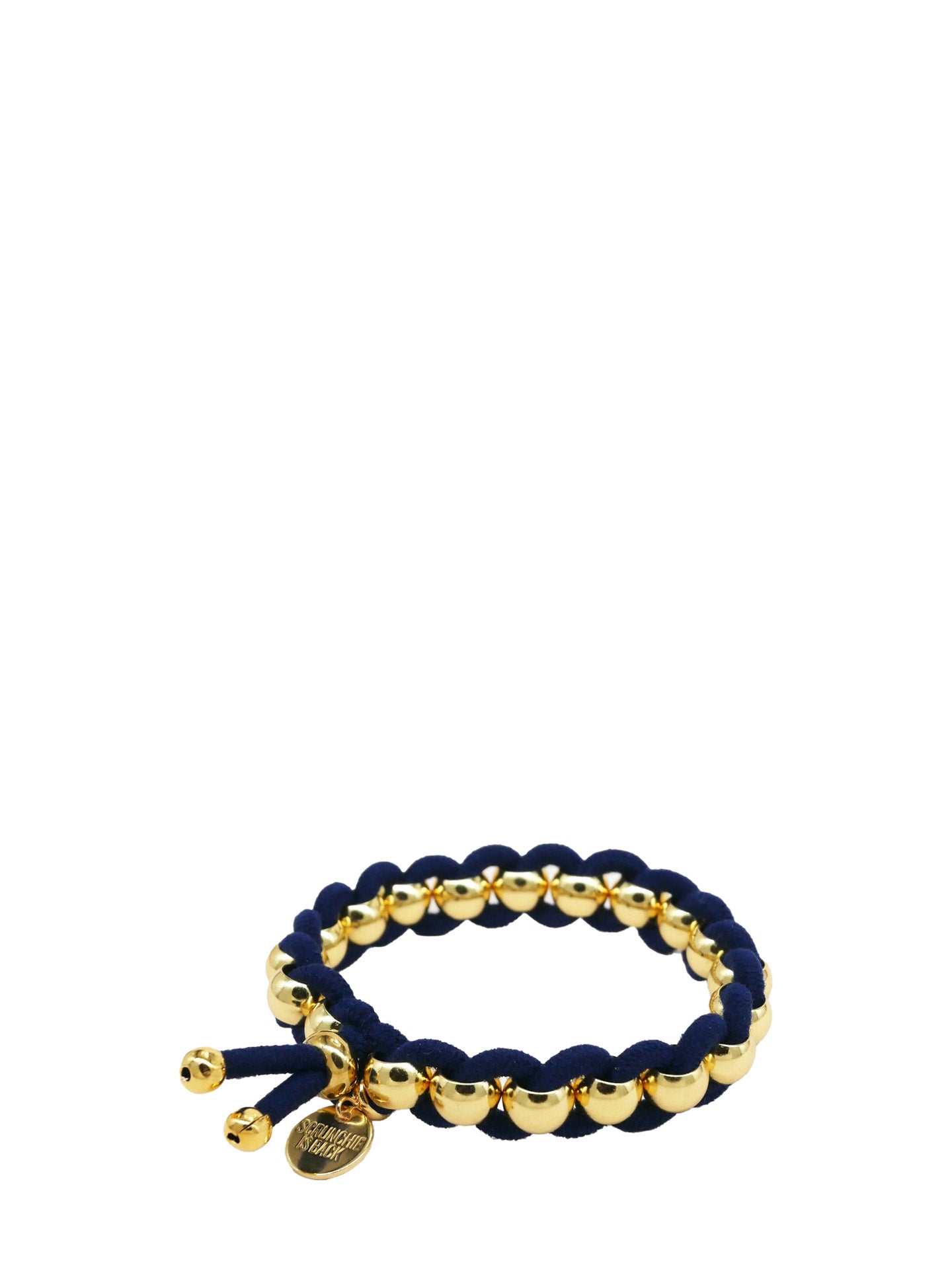 A beaded stretch bracelet hair tie featuring dark navy blue cord and polished gold-tone beads, with a small gold charm, shown on a plain white background.