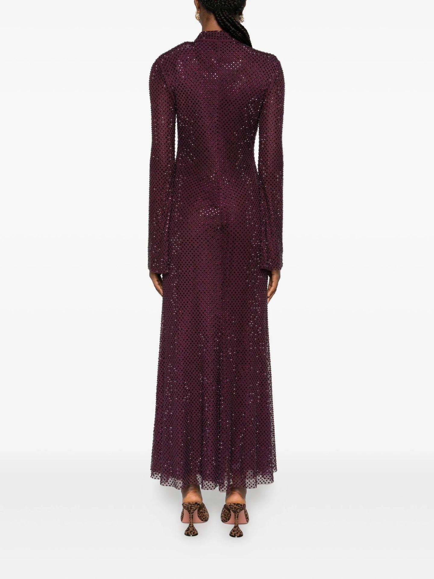 Long-sleeve dress with a textured pattern on a white background