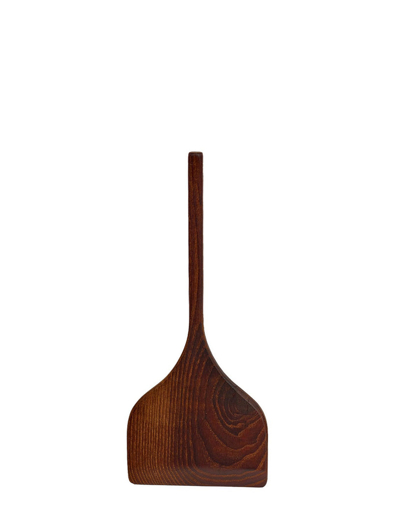 Wooden spatula on a white background