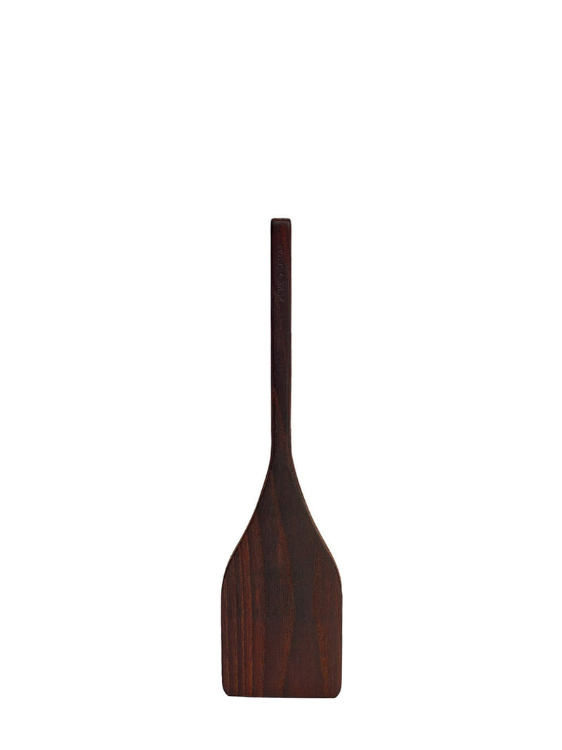 Wooden spatula on a white background