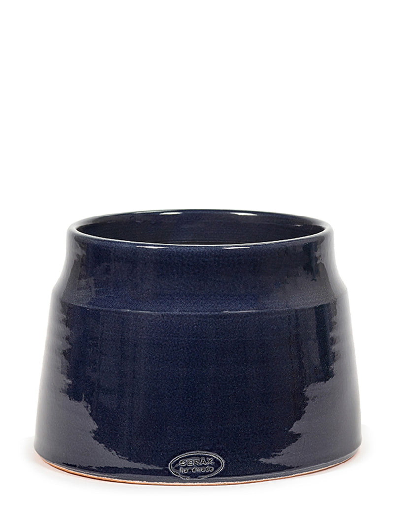 A glossy dark navy blue ceramic planter pot with a small oval 'Serax' brand logo and 'Handmade' at the base, shown on a plain white background.