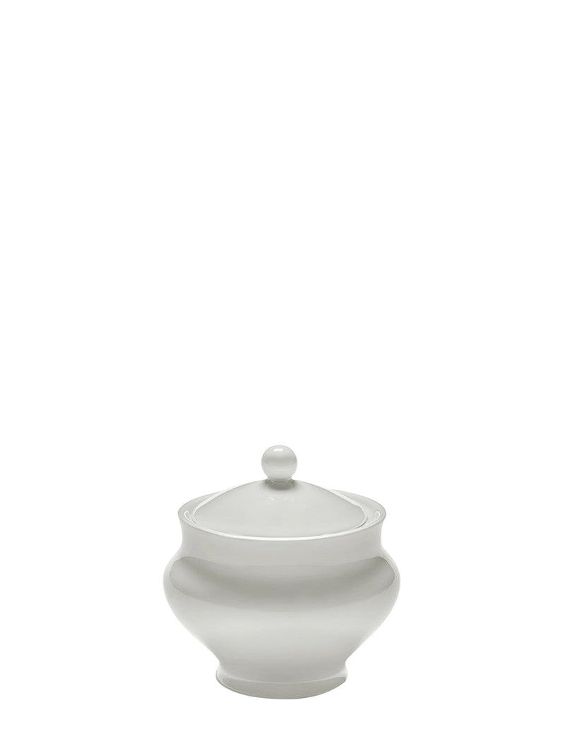 White ceramic sugar bowl with a lid on a white background