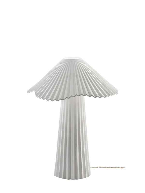 A tall white pleated table lamp with a wide, flared shade and a matching pleated cylindrical base, shown on a plain white background with a thin fabric covered braided power cord visible at the bottom right.
