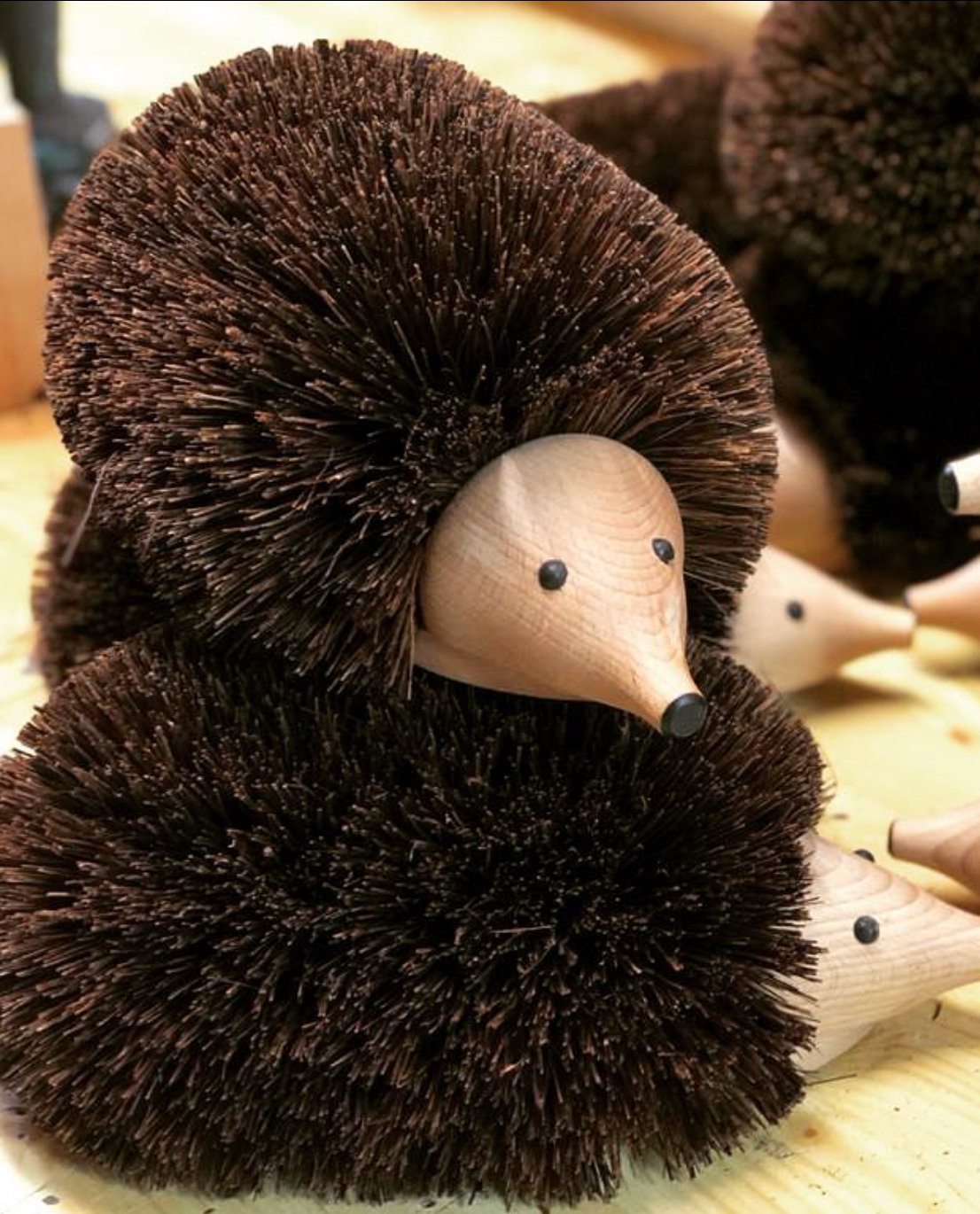 Wooden hedgehog shoe cleaner
